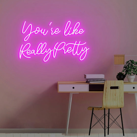 You're like Really Pretty Neon, Neon sign, Complimentary salon decor, Beauty compliment, Vibrant lighting, Stylish ambiance, Illuminated sign, Trendy neon sign, Chic beauty studio, Salon atmosphere, Compliment-inspired decor.