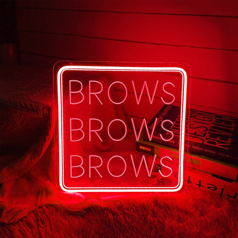 Brows Brows Brows Neon, Neon sign, Beauty salon decor, Eyebrow shaping, Brow-centric salon, Vibrant lighting, Stylish ambiance, Illuminated sign, Trendy neon sign, Chic beauty studio, Salon atmosphere, Brow artist pride, Eyebrow obsession.Trendy, Chic, Glamorous, Stylish, Bold, Eye-catching, Fashionable, Sophisticated, Vibrant, Iconic, Striking, Unique, Sleek, Modern, Alluring,