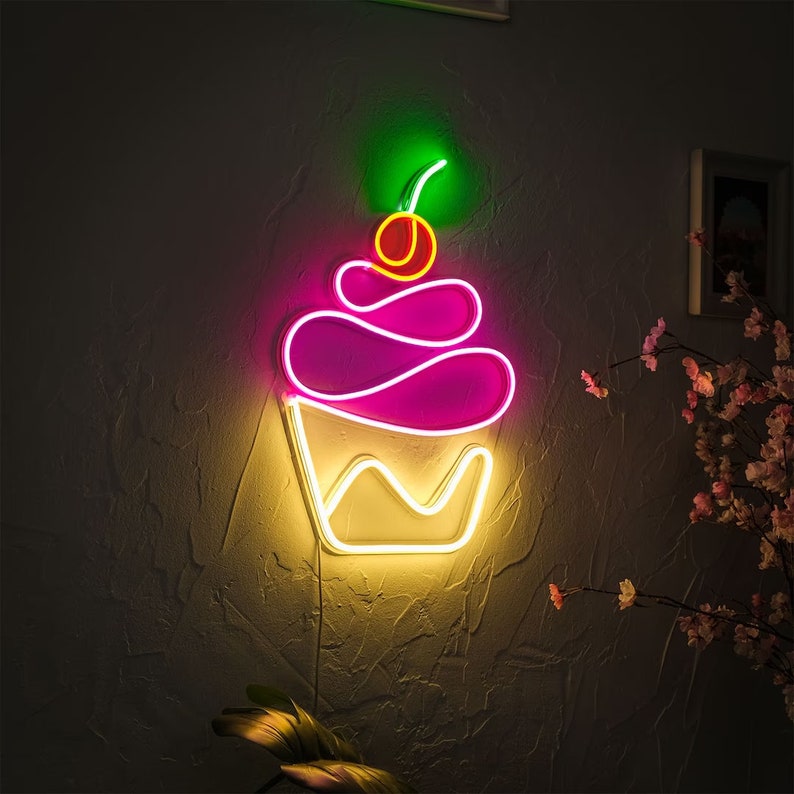 Here are the keywords for "Cupcake Neon" with spaces after each comma:  Cupcake Neon, Neon sign, Bakery decor, Cupcake-themed signage, Vibrant lighting, Stylish ambiance, Illuminated sign, Trendy neon sign, Chic bakery, Sweet atmosphere