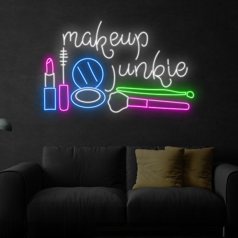 Make Up Junkie Neon, Neon sign, Beauty studio decor, Makeup enthusiast, Vibrant lighting, Stylish ambiance, Illuminated sign, Trendy neon sign, Chic makeup studio, Salon atmosphere.