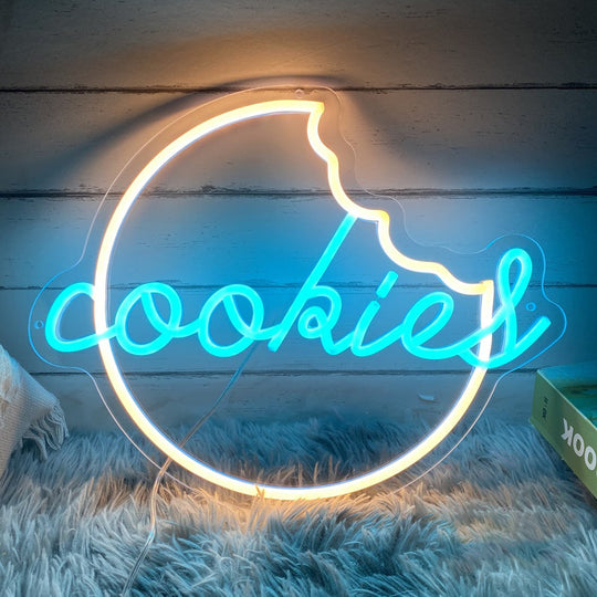 Cookies Neon, Neon sign, Bakery decor, Cookie-themed signage, Vibrant lighting, Stylish ambiance, Illuminated sign, Trendy neon sign, Chic bakery, Sweet atmosphere