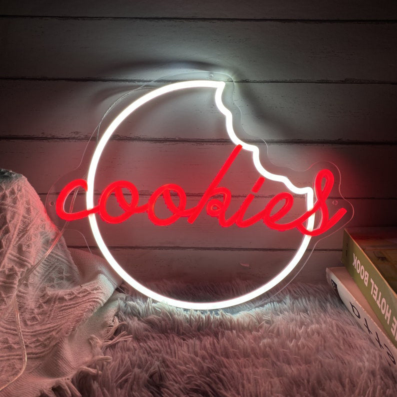 Cookies Neon, Neon sign, Bakery decor, Cookie-themed signage, Vibrant lighting, Stylish ambiance, Illuminated sign, Trendy neon sign, Chic bakery, Sweet atmosphere